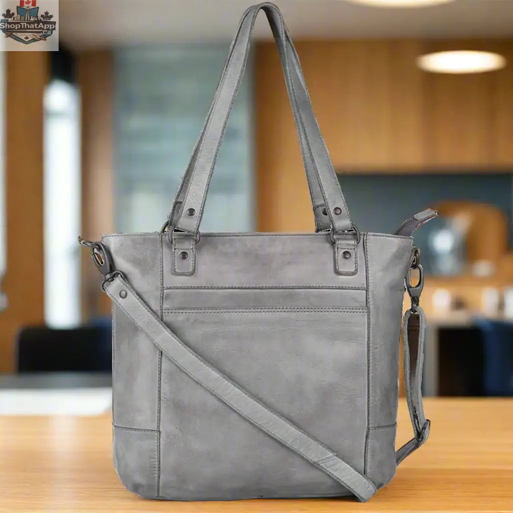 Leather handbag with two handles from Boutique of Leathers and Open Road, stylish and versatile accessory for everyday use.