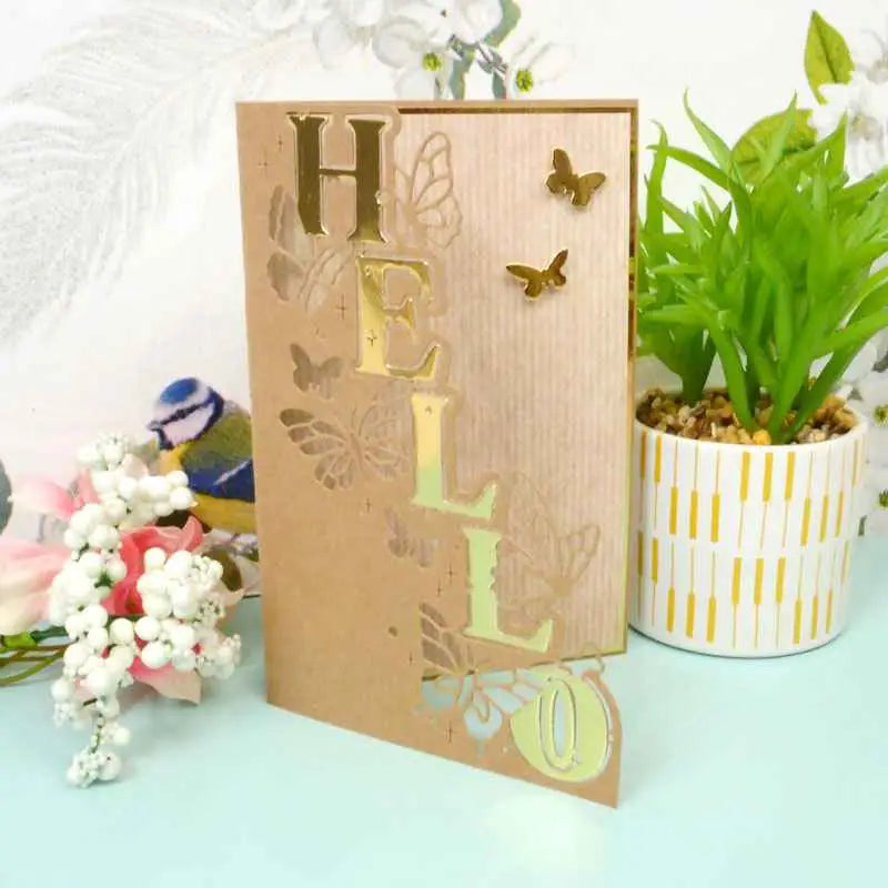 Moonstone Edge Dies by Ecstasy Crafts for die cutting, featuring a "Hello" sentiment and elegant edge design for card making.