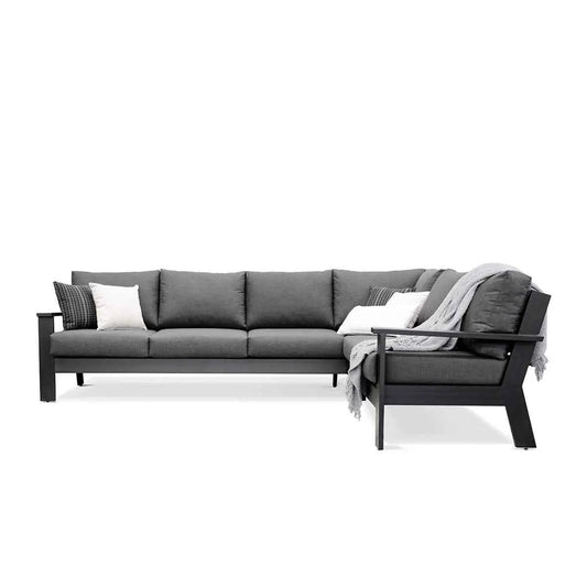 Magnolia black aluminum sectional sofa by Krikacy with Sunbrella® cast slate cushions, showcased front view.