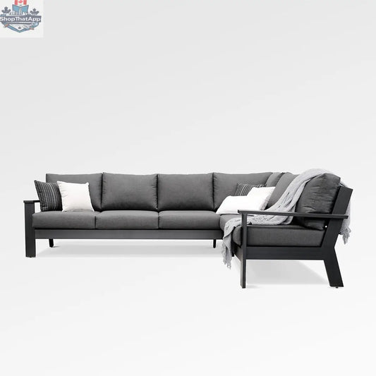 Magnolia black aluminum sectional sofa by Enclover with Sunbrella® cast slate cushions, shown from the front.