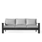 Krikacy Magnolia black aluminum sofa with Sunbrella® granite canvas cushions, modern outdoor seating with sleek design.