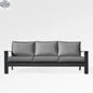 Enclover Magnolia black aluminum sofa set with Sunbrella® cushions, featuring sleek design and slate-colored cushions on a modern outdoor sofa