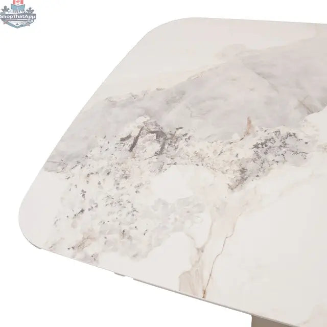 Elegant Tove ceramic dining table by Hygge Design House with a sleek surface, perfect for modern dining rooms.