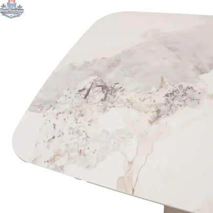 Elegant Tove ceramic dining table by Hygge Design House with a sleek surface, perfect for modern dining rooms.