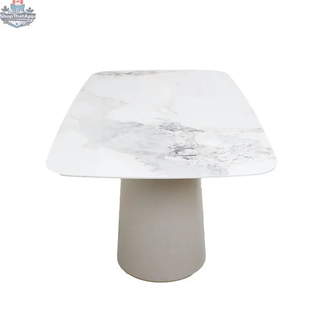 Tove ceramic dining table by Hygge Design House featuring an elegant design with a smooth surface and modern style for dining rooms.