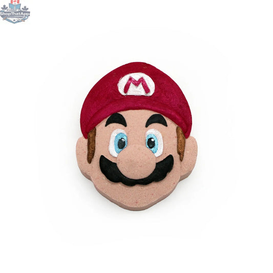 Red mushroom-shaped bath bomb called Mystic Shroom Red by The Bomb Bar Canada, inspired by Mario characters, with vibrant colors.