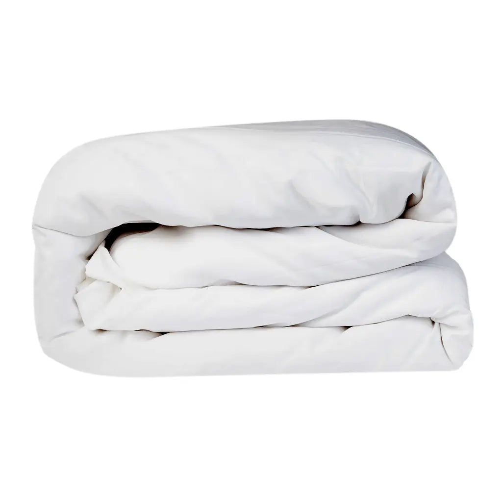 White refined sateen duvet cover by Skylark+Owl Canada, showcasing smooth, elegant fabric for a luxurious bedroom style.