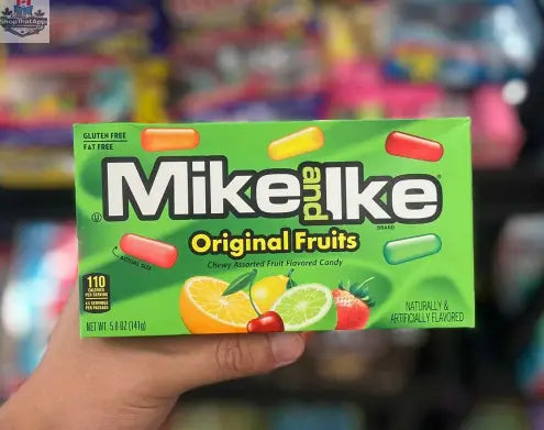 Assorted MIKE & IKE Original Fruits candy in bright colors, featuring fruity flavors and vibrant packaging from Snack Bar Co.