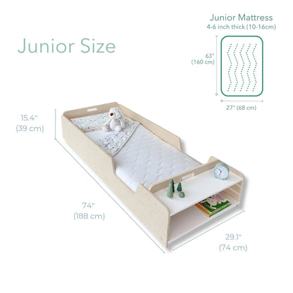 Sapiens Child Apple Junior Montessori toddler floor bed with safety rails and built-in shelves in a child's bedroom setting