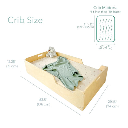 Sapiens Child Apple Crib Montessori floor bed with rails for safe, independent sleep in a toddler's bedroom.
