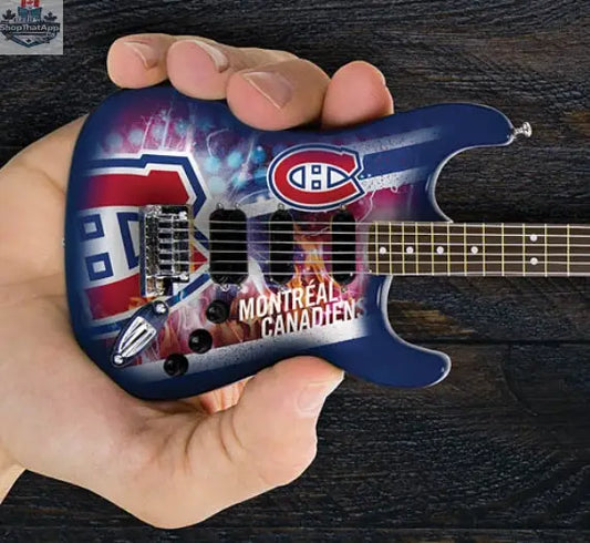 Mini Montreal Canadiens guitar by Little Guitars, 10-inch collectible mini guitar with Canadiens team logo and design.