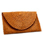 Orange pandan leaf clutch purse by Suzie Blue Canada, featuring a compact design and natural leaf texture.