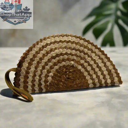 Pandan leaf clutch purse in half moon design with natural mixed tones by Suzie Blue Canada, showcasing textured leaf pattern.