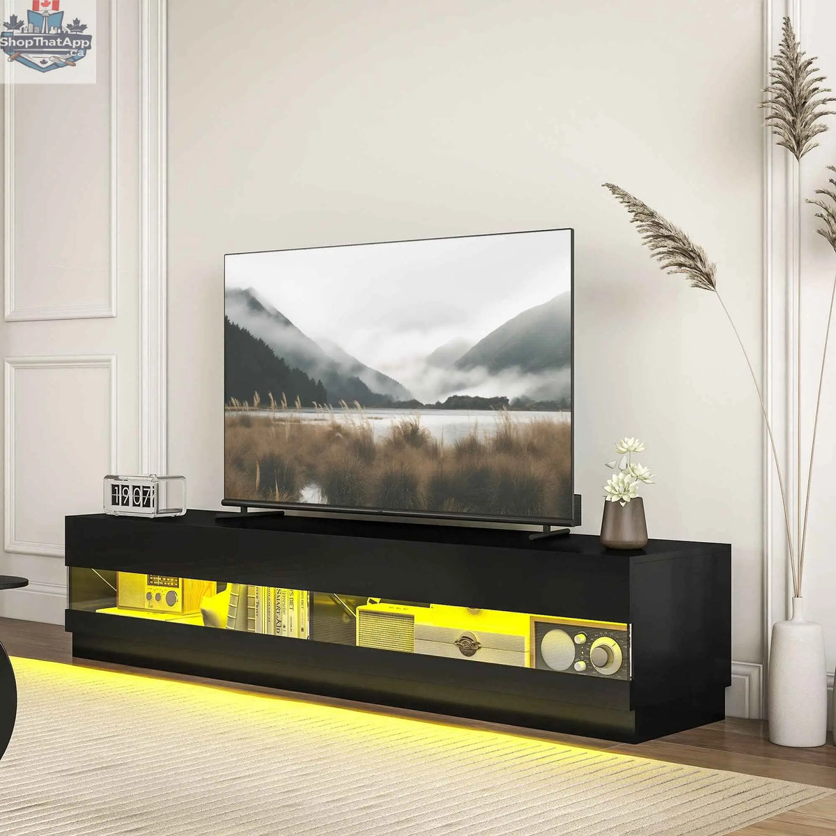 SLOTH Nation Hart lighted black TV stand for 75-inch TVs with high gloss finish, modern living room furniture for entertainment setup.