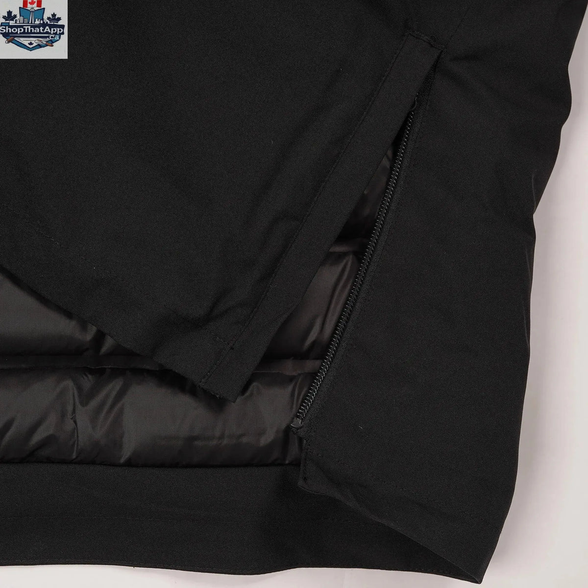 Northern Sun Crow's Waterproof Parka showing durable fabric and hood, designed for ultimate down protection in any weather.