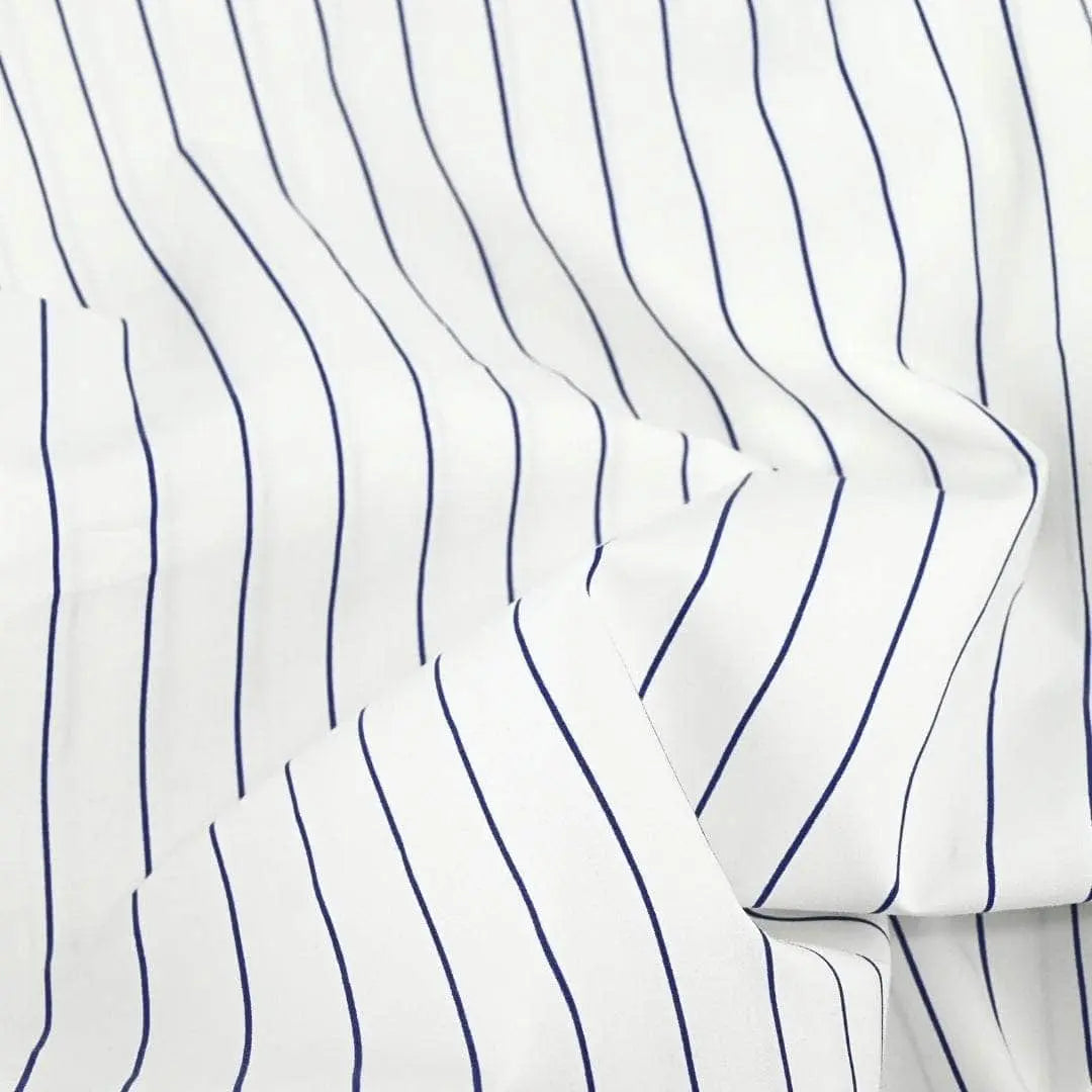 Navy striped organic cotton duvet cover by Skylark+Owl Canada, featuring smooth percale fabric and modern style.