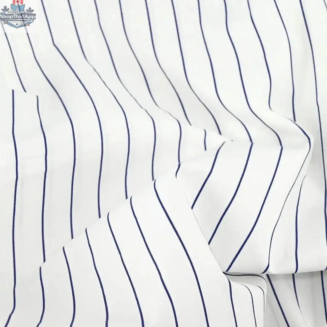 Navy and white striped organic percale pillowcase set by Skylark+Owl Canada, soft and breathable fabric for luxurious sleep.