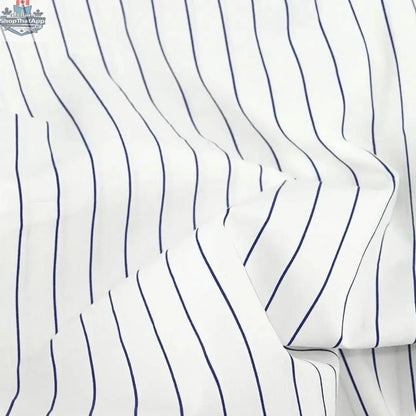 Navy and white striped organic percale pillowcase set by Skylark+Owl Canada, soft and breathable fabric for luxurious sleep.