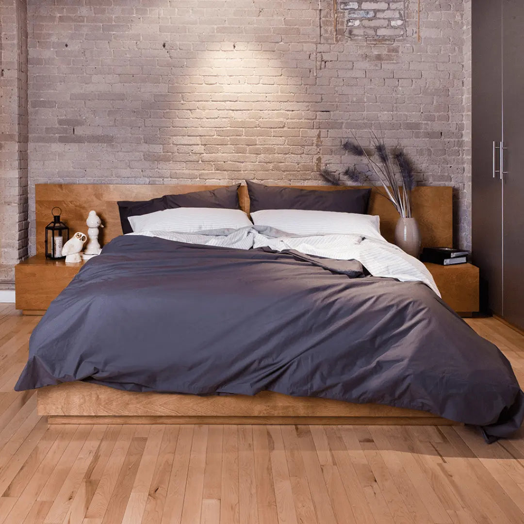 Organic percale duvet cover set and pillowcases by Skylark+Owl Canada, featuring soft, washed cotton linen in a fresh, natural design.