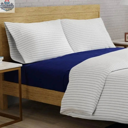 Organic percale pillowcase set by Skylark+Owl Canada, soft washed linen for luxurious sleep, shown in natural fabric detail.