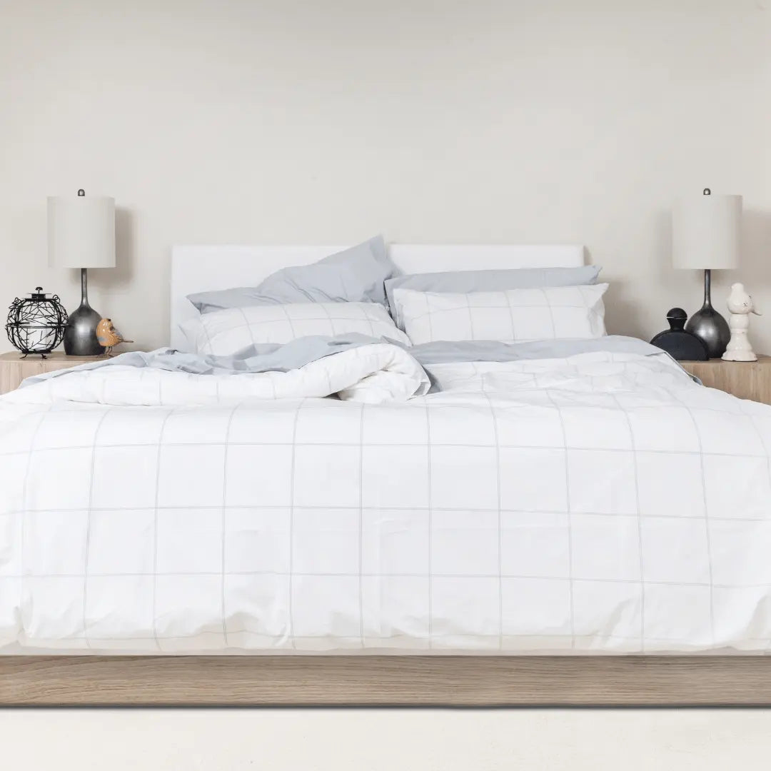 Organic percale duvet cover set and pillowcases by Skylark+Owl Canada, soft washed linen bedding in neutral tones.