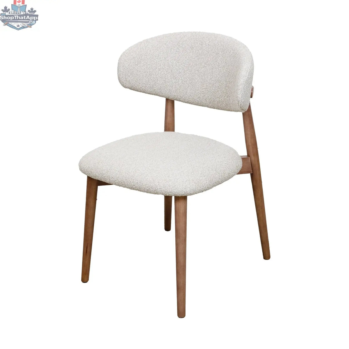Natural wooden Hygge Design House Cammy dining chair with a sleek, modern design and comfortable seat.