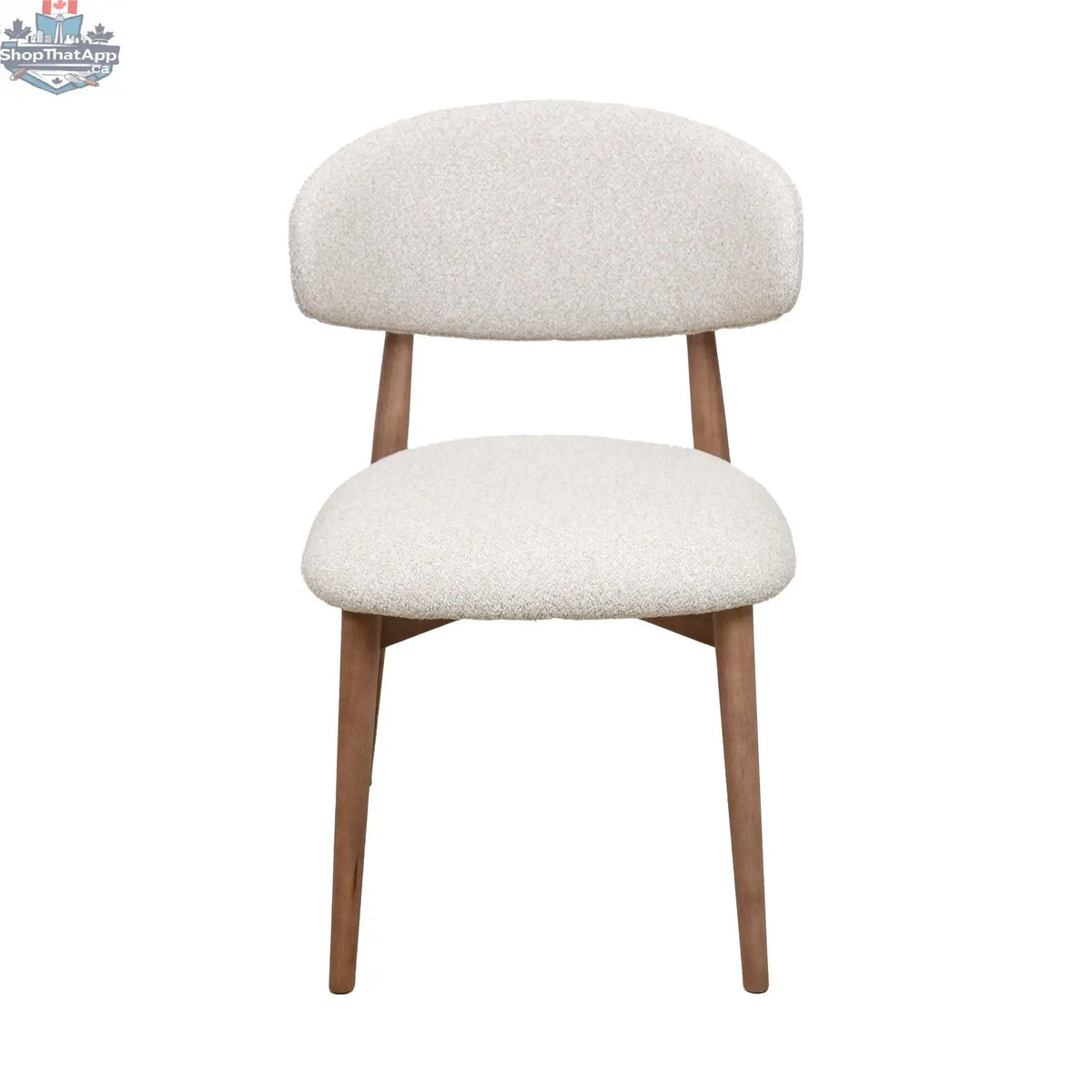 Nikari natural wood Cammy dining chair by Hygge Design House with sleek, modern design and curved backrest for comfortable seating.