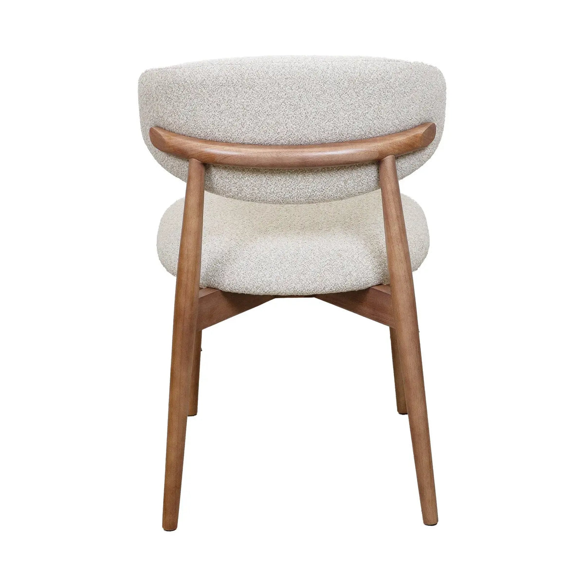 Natural wood Hygge Design House Cammy Dining Chair with sleek, minimalist design and comfortable seating.