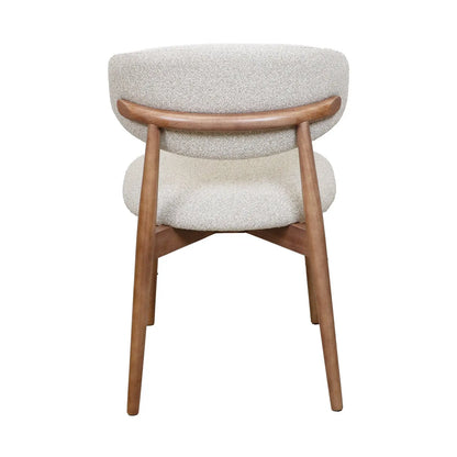 Natural wood Hygge Design House Cammy Dining Chair with sleek, minimalist design and comfortable seating.
