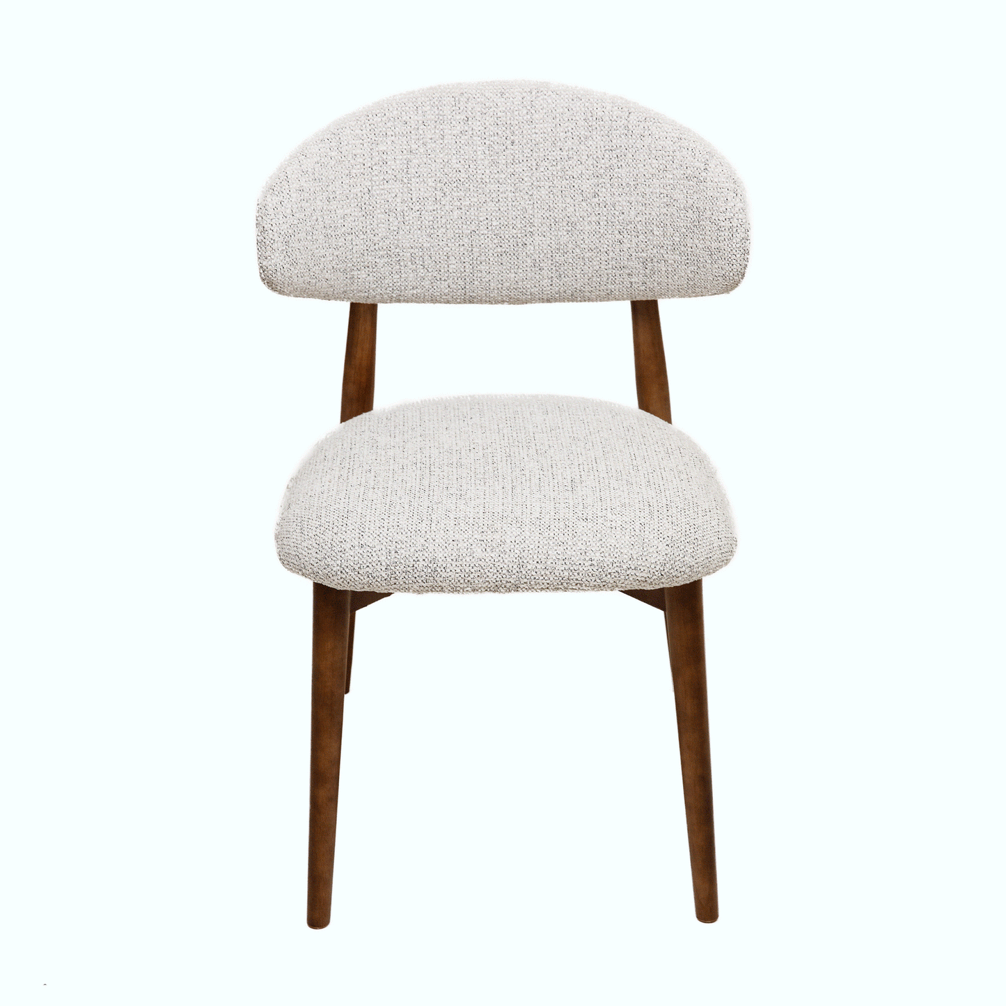 Light grey Hygge Design House Cammy dining chair with wooden legs and modern, minimalist style.