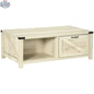White oak Lowen farmhouse coffee table with drawer and open storage shelf, crafted by SLOTH Nation, shown in a modern living room setting.