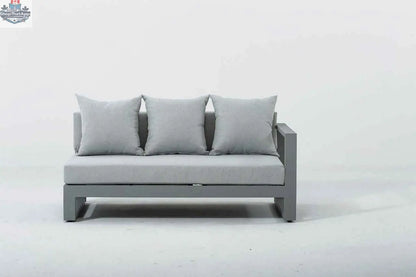 Krikacy Oasis outdoor sectional sofa with right arm loveseat, aluminum frame, and cushioned seats in a modern patio setting.