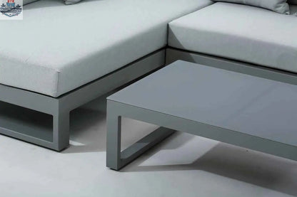 Krikacy Oasis outdoor sectional sofa with aluminum frame, featuring cushioned seats and modern design for outdoor lounging.