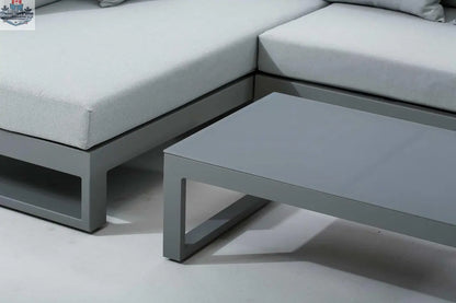 Enclover Oasis sectional sofa with modern design, featuring plush cushions and sleek upholstery for stylish living room comfort.