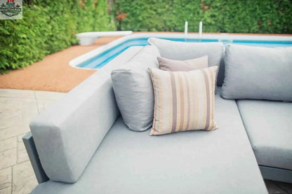 Krikacy Oasis outdoor sectional sofa with three aluminum sections, featuring plush cushions and modern patio design.