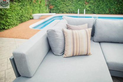 Enclover Oasis sectional sofa with plush cushions and modern design, shown in a stylish living room setting.