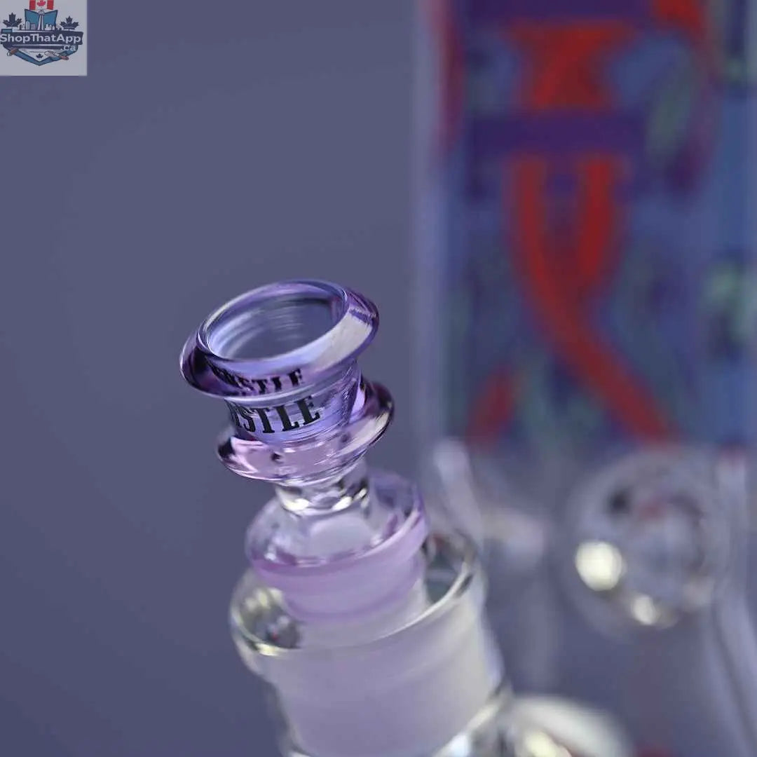 Close-up of 16-inch purple Castle Glassworks octopus beaker bong with 9mm thick glass and a detailed glass bowl.