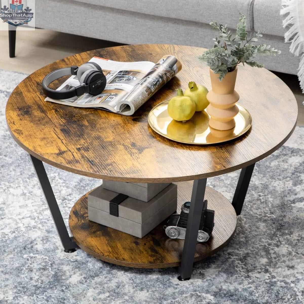 Rustic brown round coffee table with storage shelf by SLOTH Nation, featuring a sturdy wooden design and functional storage space.