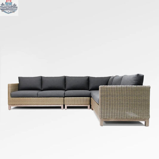 Enclover olive sectional sofa with Sunbrella Spectrum Carbon cushions, designed for six-seat comfort, featuring a modern sectional layout.