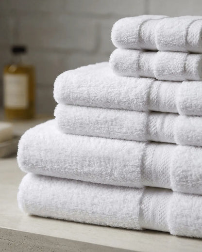 Six-piece Opulence towel set by Skylark+Owl Canada featuring soft, organic textured towels in neutral tones.