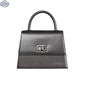 Origyn 03 vegan leather handbag made with plastic-free MIRUM® eco-friendly material, featuring a sleek, modern design.