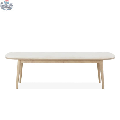 Hygge Design House Mons dining bench with wooden legs and cushioned seat, ideal for modern dining room decor.