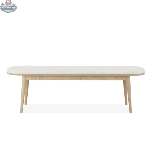 Hygge Design House Mons dining bench with wooden legs and cushioned seat, ideal for modern dining room decor.