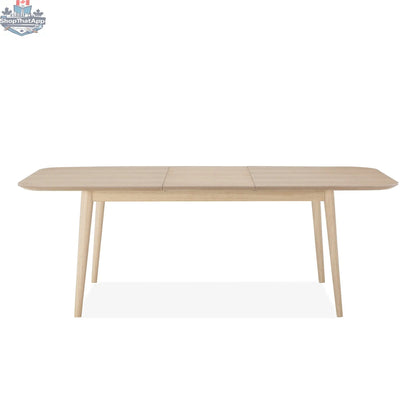 Hygge Design House Mons Extendable Dining Table with wood finish, extended to showcase its versatile, modern design.