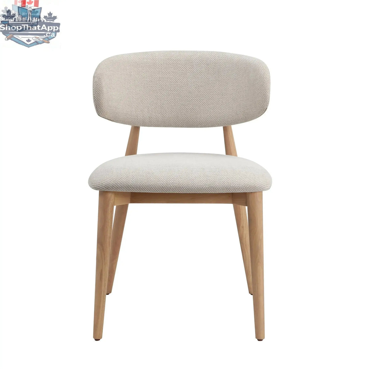 Nero Vogar dining chair by Hygge Design House with sleek black upholstery and modern wooden legs.