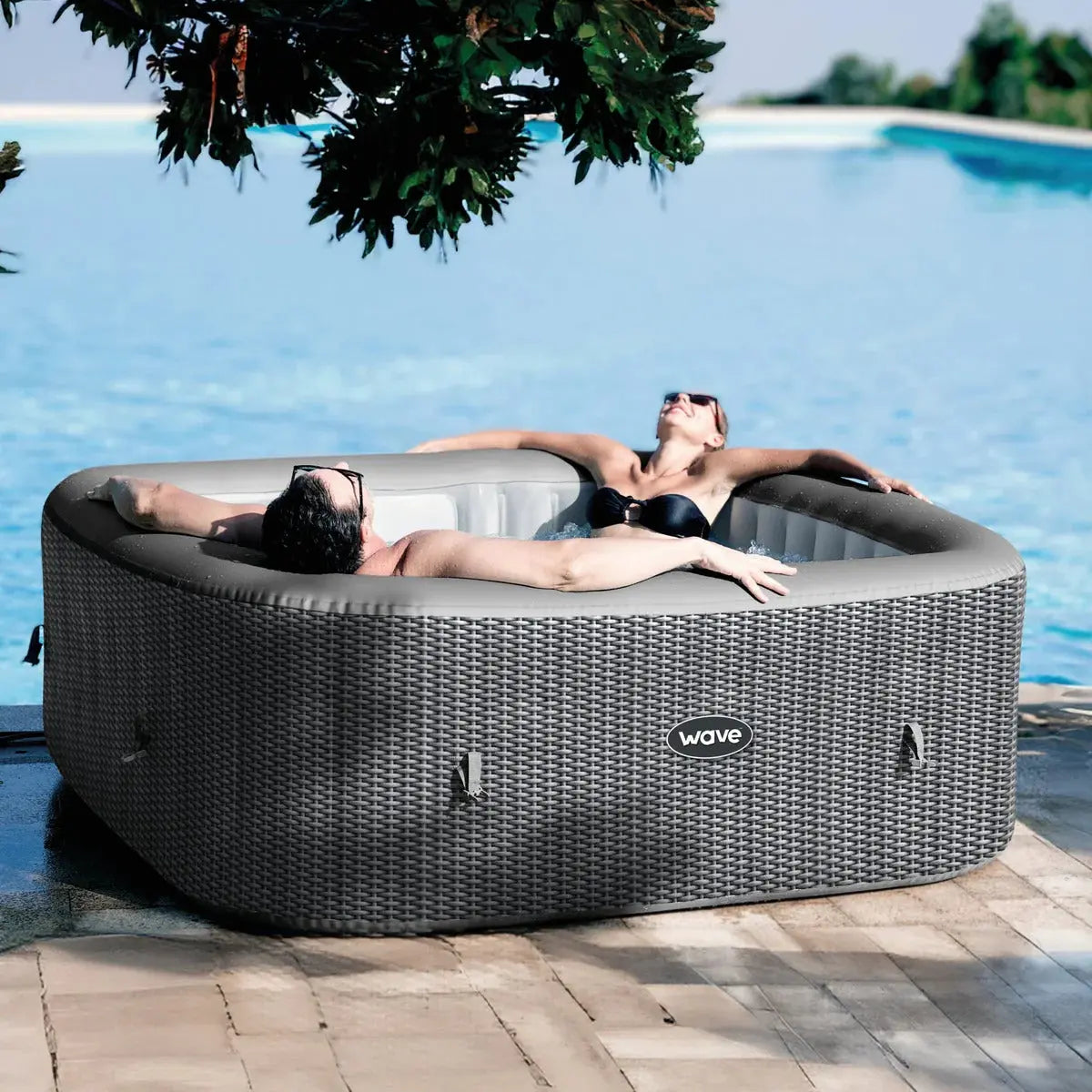 Zoppinh Wave Pacific 4/6-person inflatable square hot tub with integrated heater, showcasing the soft, inflatable spa with control panel.