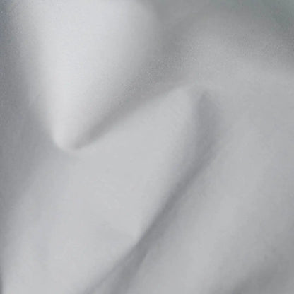 Light grey organic percale sheets from Skylark+Owl Canada, part of the luxurious Essential Organic Percale Sheets Collection.