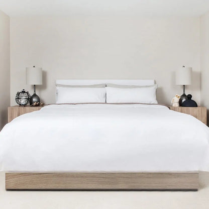 White Skylark+Owl Canada satin pillowcase from Zenith Turkish bath sheets collection, soft, luxurious, and spa-quality bedding.