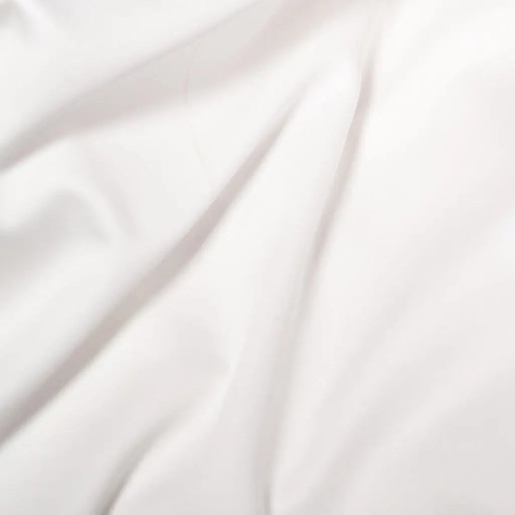 White Skylark+Owl Canada satin pillowcase featuring smooth, luxurious sateen fabric with a soft, shiny finish.