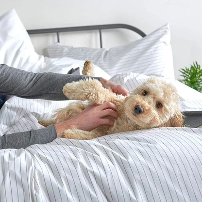 Charcoal stripe organic percale pillowcase set by Skylark+Owl Canada, soft and breathable for luxurious sleep.